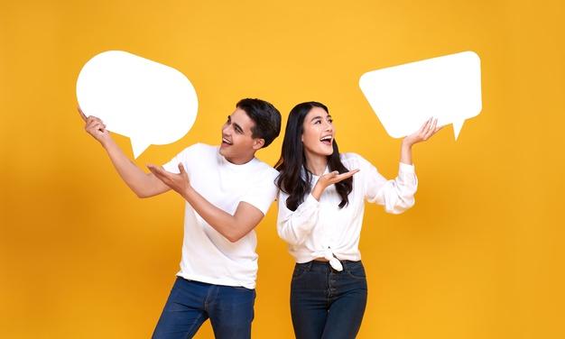 smiling-happy-asian-couple-holding-blank-speech-bubbles-yellow_74952-953.jpg